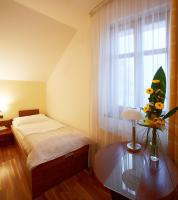 Postel nebo postele na pokoji v ubytování Hotel Penzion Na Hradě