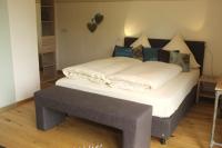 Postel nebo postele na pokoji v ubytování Dreimäderlhaus - Das vegetarische Boutique Hotel
