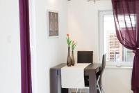 Televízia a/alebo spoločenská miestnosť v ubytovaní Split Allure Apartments