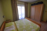 Łóżko lub łóżka w pokoju w obiekcie Jurica Apartments