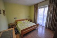 Łóżko lub łóżka w pokoju w obiekcie Jurica Apartments