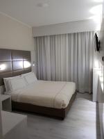 Agape Hotel AA Hotelsにあるベッド