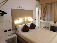Agape Hotel AA Hotelsにあるベッド