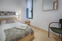 Postel nebo postele na pokoji v ubytování Habitat Apartments Alibei