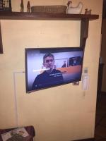 Bungalow in Our Gardenにあるテレビまたはエンターテインメントセンター