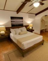 Postel nebo postele na pokoji v ubytování El Morro Eco Adventure Hotel