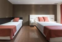 Postel nebo postele na pokoji v ubytování Hotel Pradillo Conil