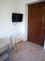TV a/nebo společenská místnost v ubytování Casale di Burano