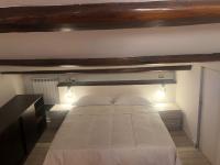 Posteľ alebo postele v izbe v ubytovaní CasaJusta Trastevere