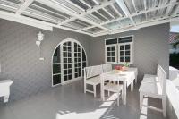 Posezení v ubytování Loma Pool Villa