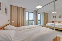 Posteľ alebo postele v izbe v ubytovaní The Darling Nadmorze by Baltica Apartments