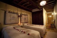 A bed or beds in a room at O Muiño de Pena