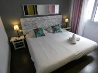 Postel nebo postele na pokoji v ubytování Oasis Backpackers' Toledo