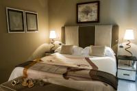 Postel nebo postele na pokoji v ubytování Hotel Villa Ducale