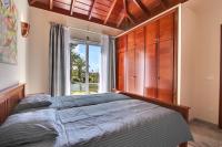 Posteľ alebo postele v izbe v ubytovaní Villa Javier La Palma