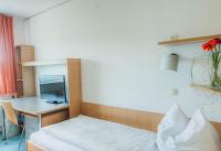 Posteľ alebo postele v izbe v ubytovaní Kolpinghaus Salzburg - SommerHOSTEL