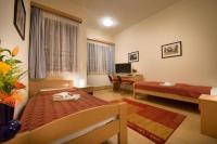 Łóżko lub łóżka w pokoju w obiekcie Grand Hotel