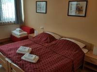 Łóżko lub łóżka w pokoju w obiekcie Grand Hotel