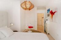 Postel nebo postele na pokoji v ubytování San Juan FreshApartments