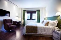 Posteľ alebo postele v izbe v ubytovaní Hotel & Winery Señorío de Nevada