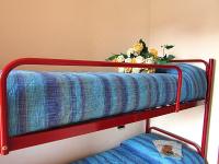 A bed or beds in a room at Andrea
