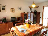 A television and/or entertainment centre at Andrea