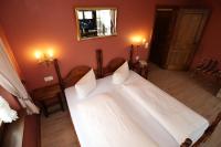 Postel nebo postele na pokoji v ubytování Schwarzwaldhotel Stollen