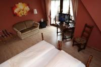 TV a/nebo společenská místnost v ubytování Schwarzwaldhotel Stollen