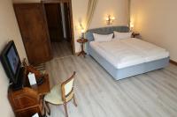 Postel nebo postele na pokoji v ubytování Schwarzwaldhotel Stollen