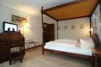Postel nebo postele na pokoji v ubytování Schwarzwaldhotel Stollen
