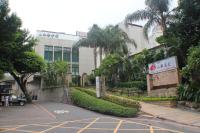 an empty street in front of a building at Shan-Yue Hotspring Hotel in Taipei