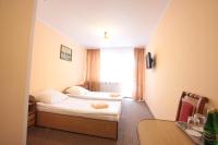 Łóżko lub łóżka w pokoju w obiekcie Hotel Zamek