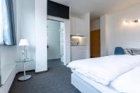 Postel nebo postele na pokoji v ubytování Vienna Cube Apartments Contactless Check IN