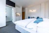 Postel nebo postele na pokoji v ubytování Vienna Cube Apartments Contactless Check IN