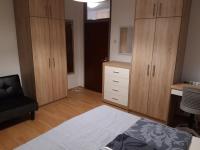 Posteľ alebo postele v izbe v ubytovaní Apartman Centros