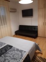 Posteľ alebo postele v izbe v ubytovaní Apartman Centros