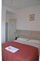 Posteľ alebo postele v izbe v ubytovaní Hotel Zenith