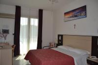 Posteľ alebo postele v izbe v ubytovaní Hotel Zenith