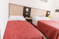 Posteľ alebo postele v izbe v ubytovaní Hotel Zenith
