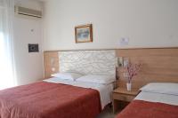 Posteľ alebo postele v izbe v ubytovaní Hotel Zenith