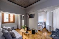 TV a/nebo společenská místnost v ubytování Candia Suites & Rooms