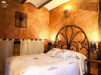 Postel nebo postele na pokoji v ubytování Casas Rurales Chon Alto Tajo