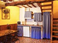 Kuchyň nebo kuchyňský kout v ubytování Casas Rurales Chon Alto Tajo