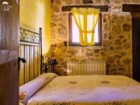 Postel nebo postele na pokoji v ubytování Casas Rurales Chon Alto Tajo