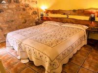 Postel nebo postele na pokoji v ubytování Casas Rurales Chon Alto Tajo