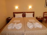 Łóżko lub łóżka w pokoju w obiekcie Elafonisos Diamond Resort