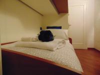 Posteľ alebo postele v izbe v ubytovaní Dante's Rooms