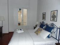 Posteľ alebo postele v izbe v ubytovaní Dante's Rooms