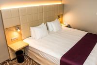 Posteľ alebo postele v izbe v ubytovaní Holiday Inn Budapest-Budaörs by IHG