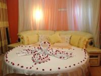 a cross made out of hearts on a bed at Chester View Homestay in Syokimau
